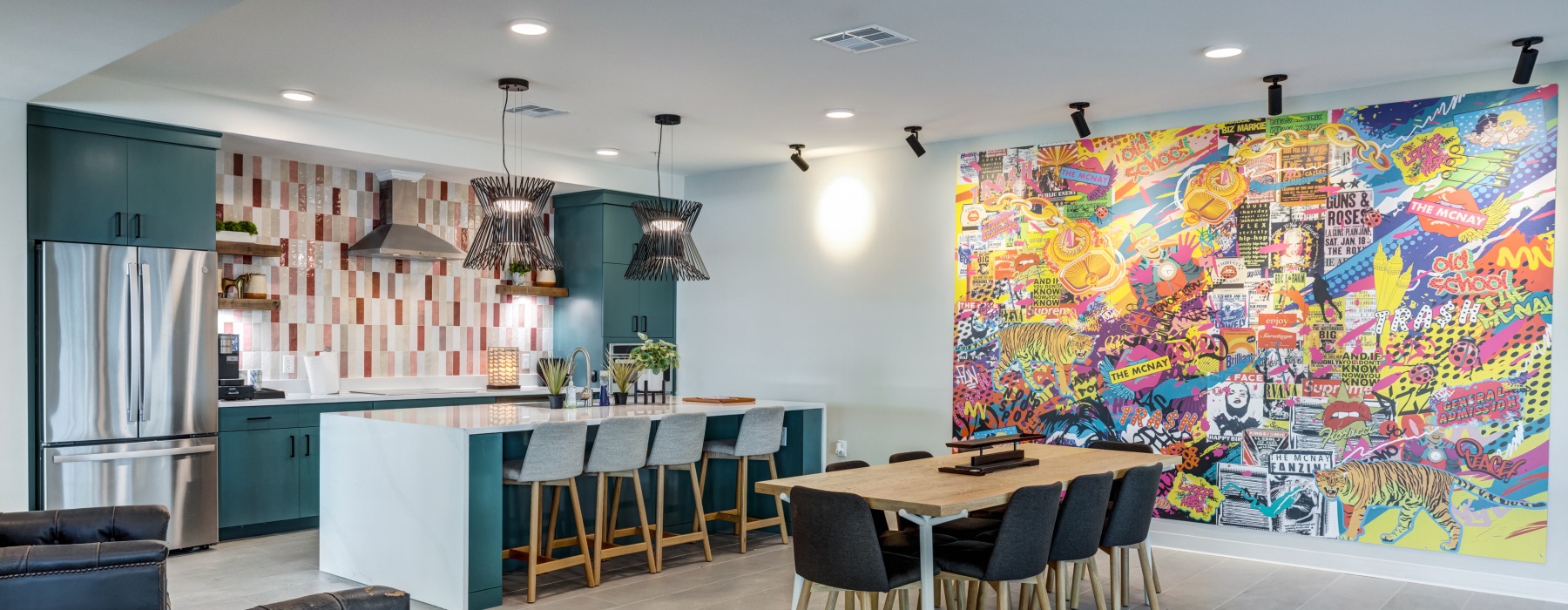 Clubhouse kitchen and dining lounge with mural wall