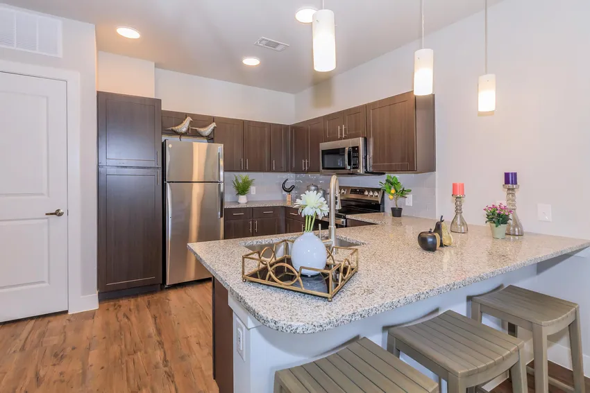 Apartment kitchen with granite counters