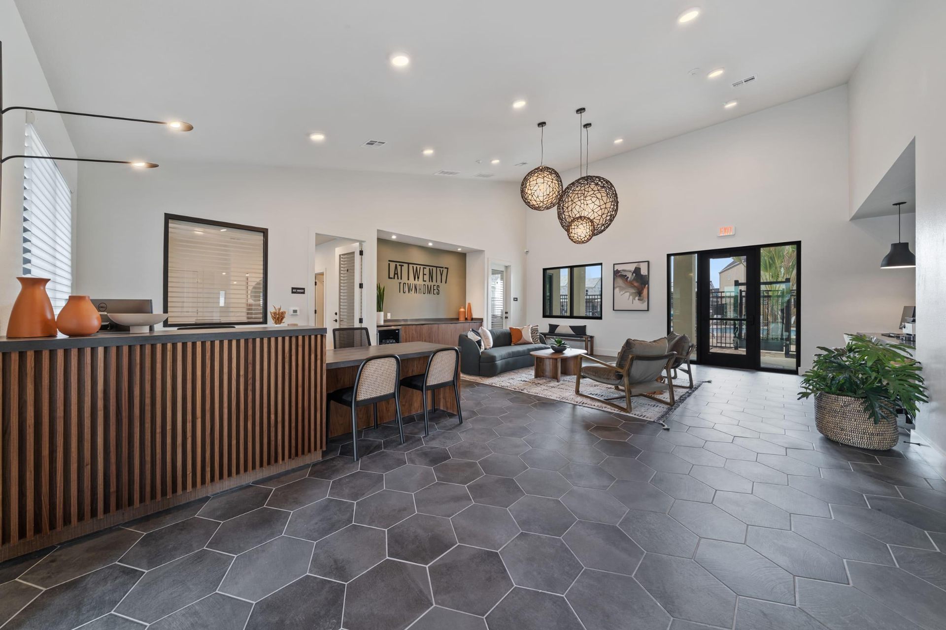 Leasing lobby with hex tile floor and modern lounge