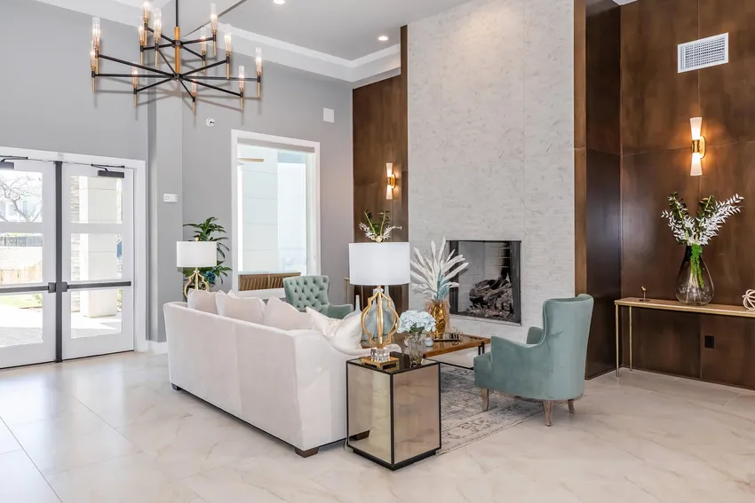 Clubhouse lobby with chandelier and fireplace