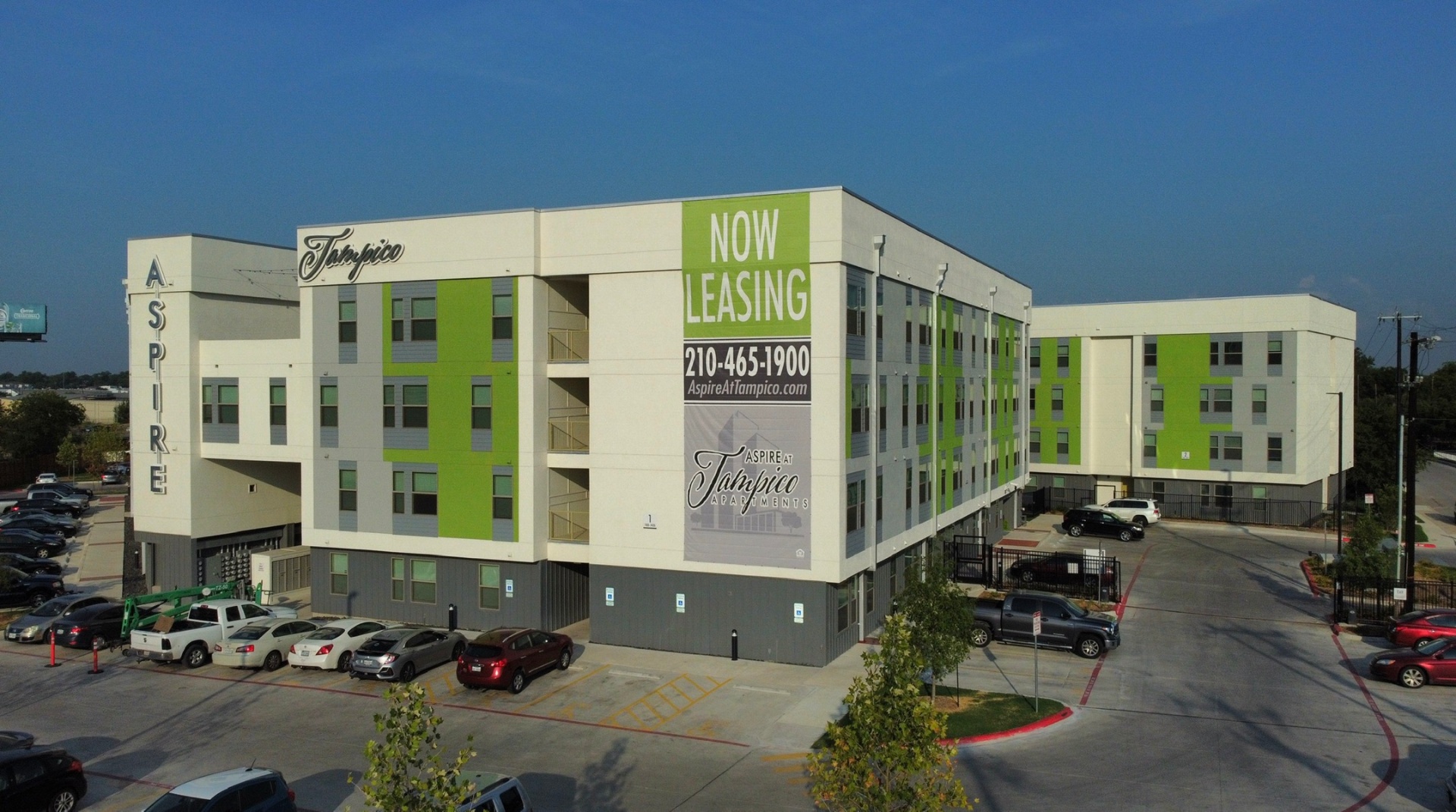 Aspire at Tampico exterior with Now Leasing signage