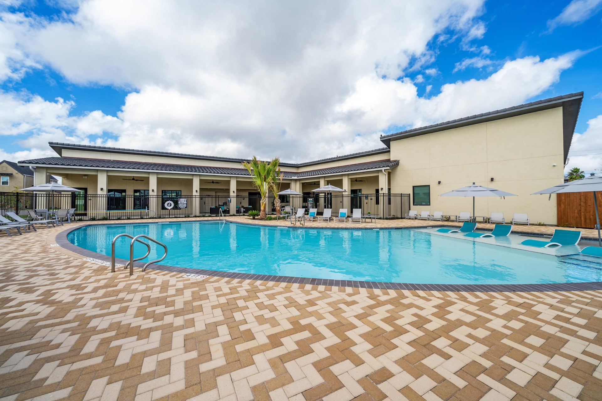 Resort-style pool with clubhouse